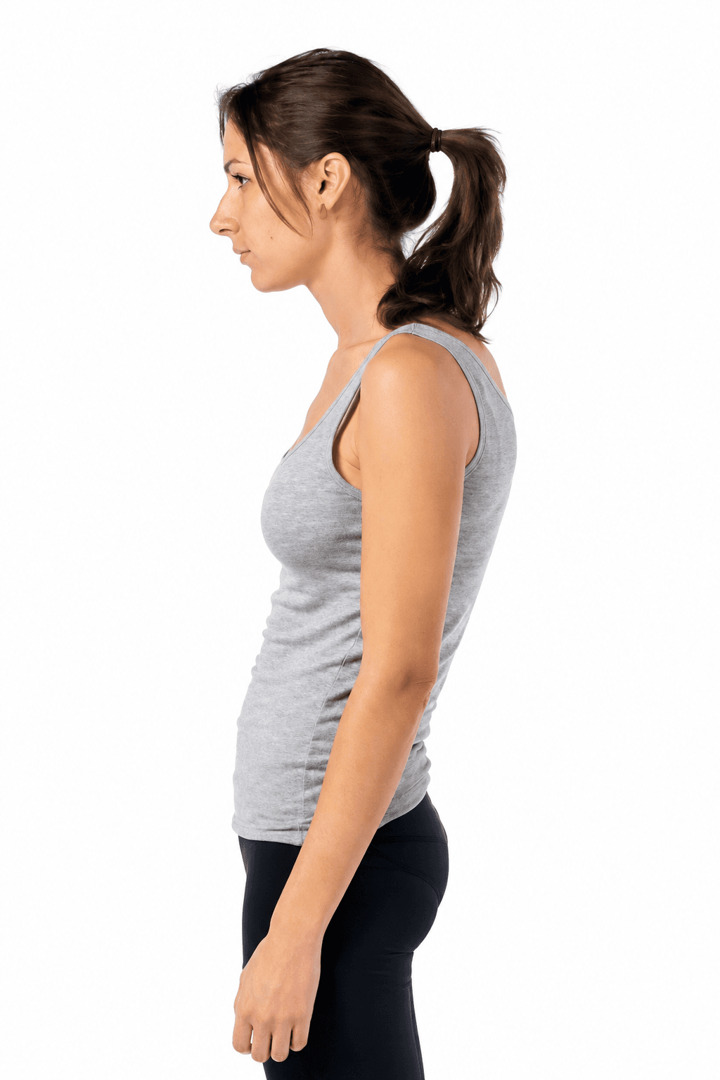 An adult woman in profile years later, the head further forward and the upper back more visibly rounded.